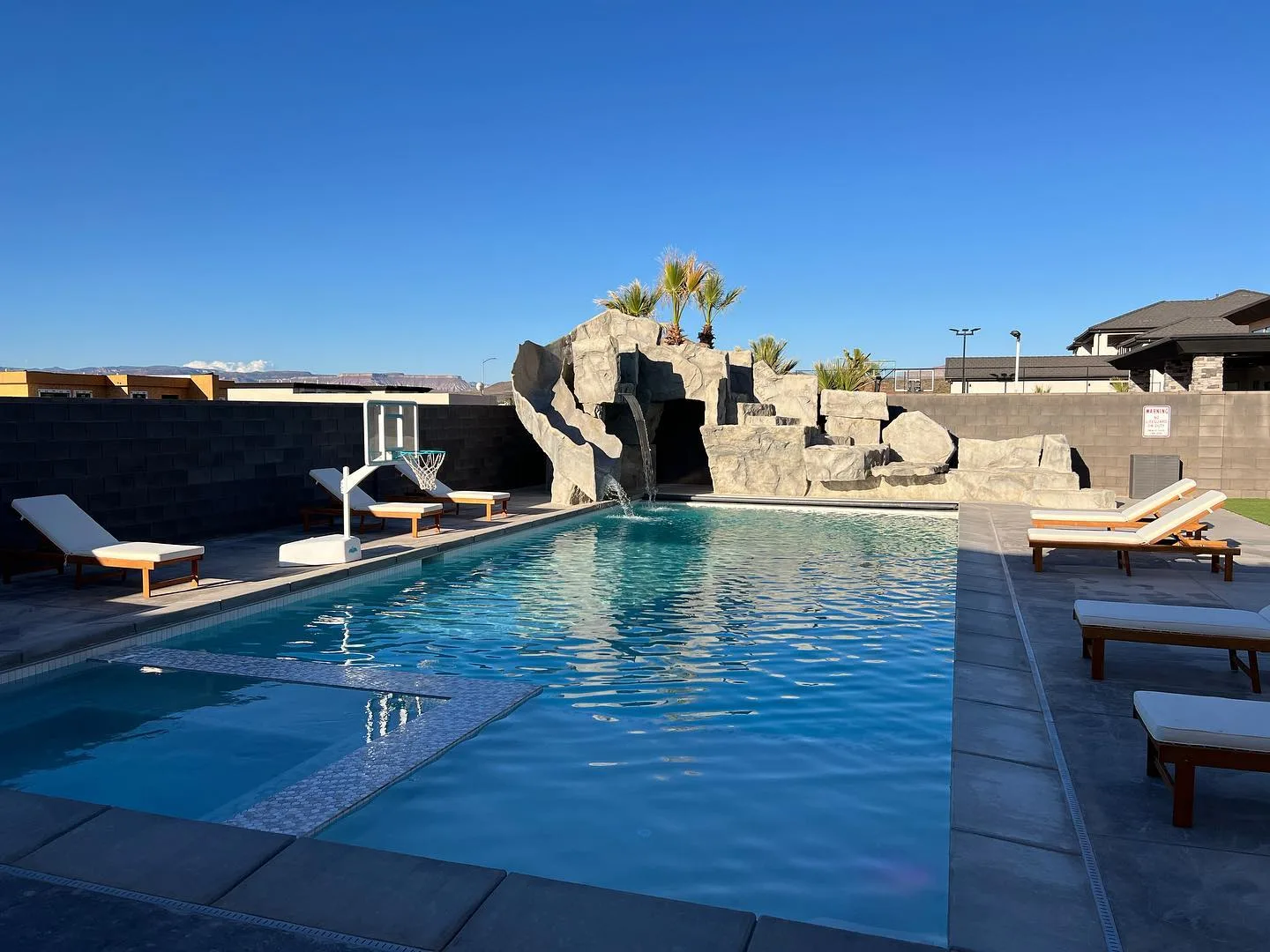 Natural rock waterfall and resort pool